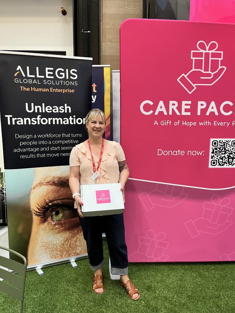 Aquent's Monika Pflicke makes Care Packs at Allegis charity event, July 2025